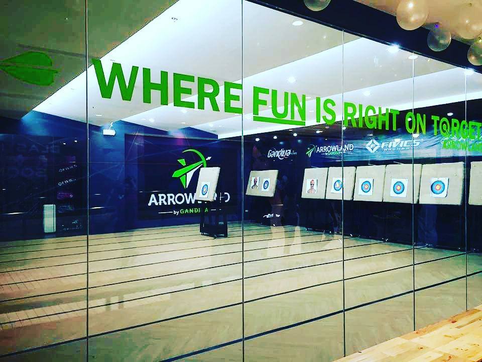 Arrowland range with targets and brand banners
